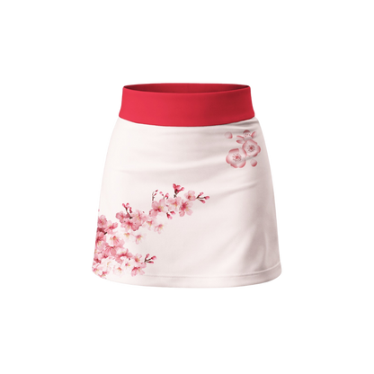 White skirt with pink floral patterns and red waistband on a white background