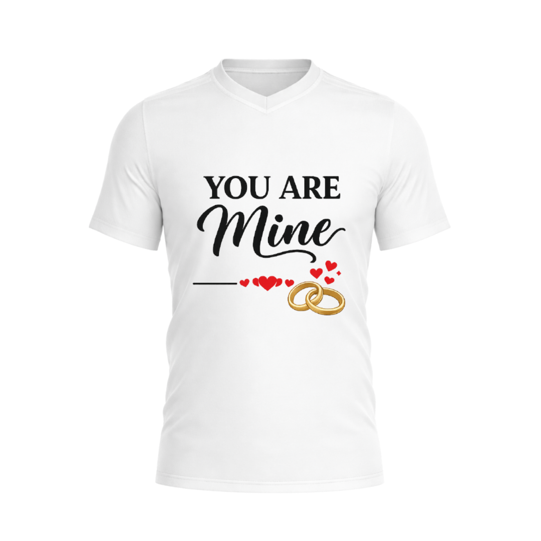 White t-shirt with 'You Are Mine' text and wedding rings design on a white background