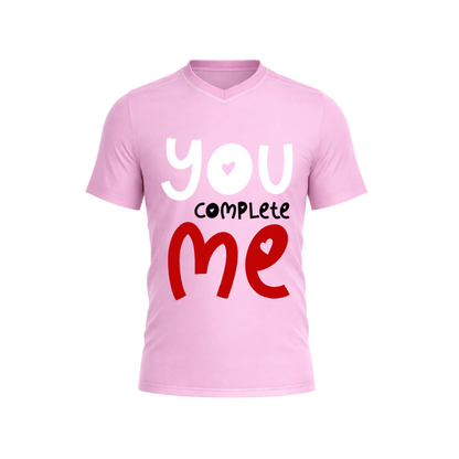 Pink t-shirt with 'you complete me' text on a white background