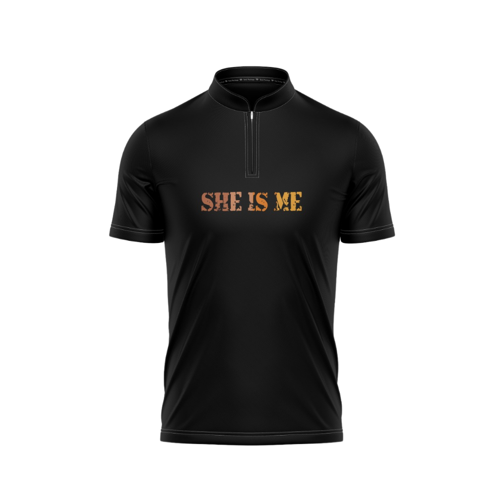 Black shirt with 'SHE IS ME' text on a white background