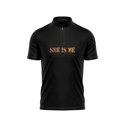 Black shirt with 'SHE IS ME' text on a white background