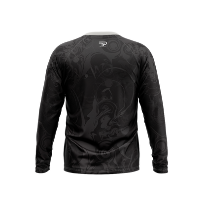 Black long-sleeve shirt with intricate designs on a white background