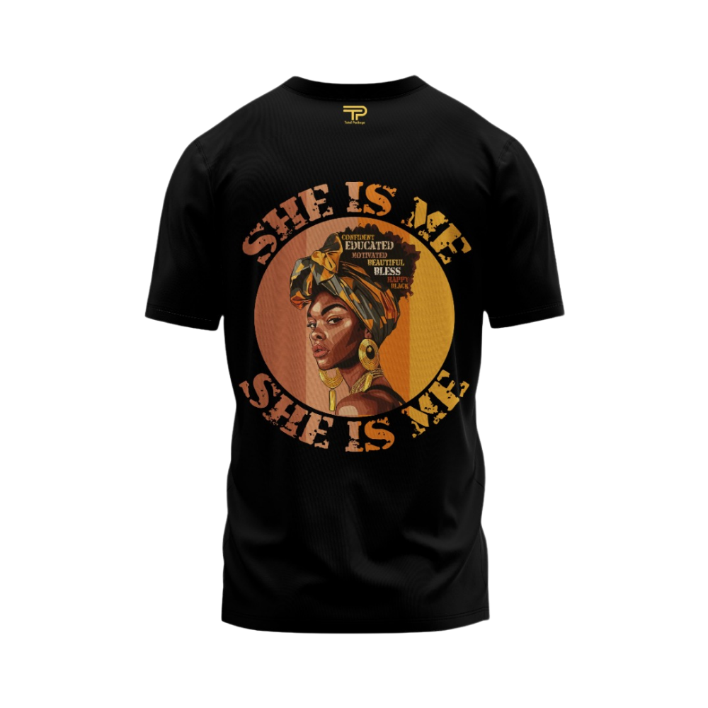 Black t-shirt with a graphic of a woman wearing a headscarf and text 'She is Me, She is Black' on a white background.