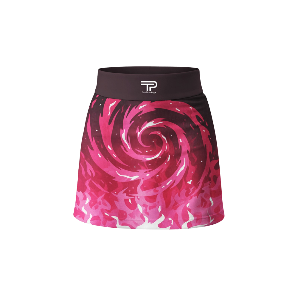 Pink and black swirl patterned skirt on a white background